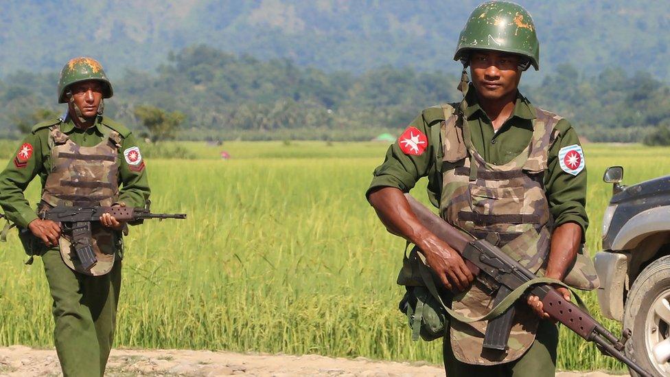 Myanmar army soldiers patrol a village in Maungdaw located in Rakhine State as security operation continue following the October 9, 2016 attacks by armed militant Muslim.