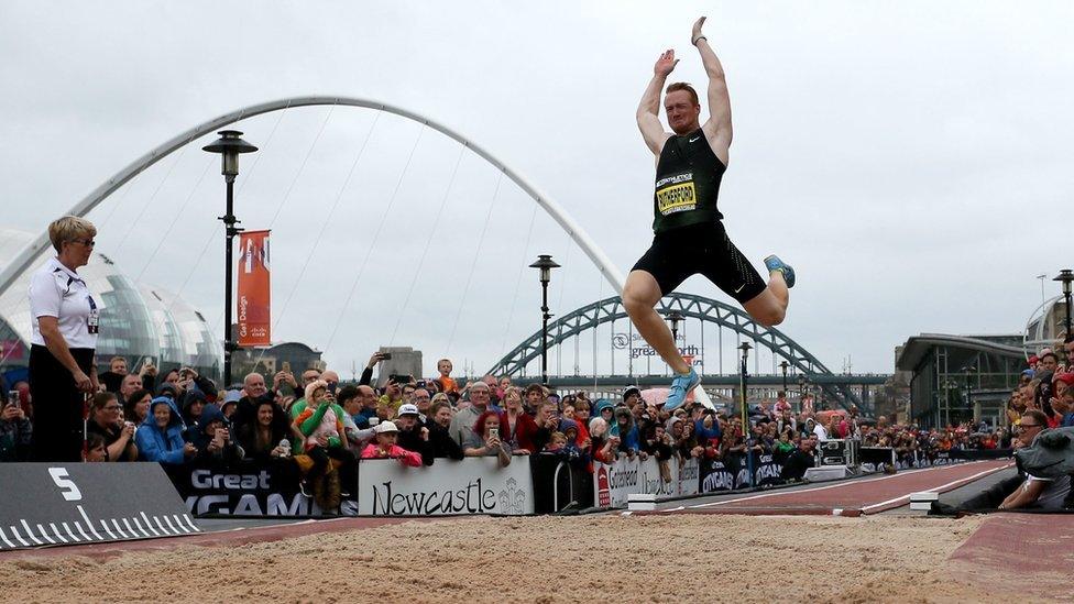 Greg Rutherford competing in the long jump event