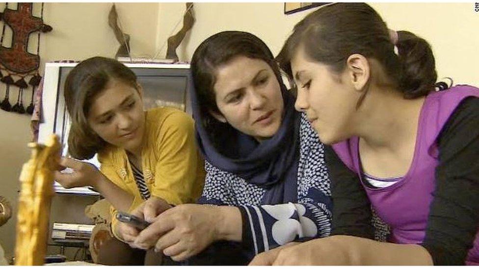 Fawzia Koofi flanked by her daughters