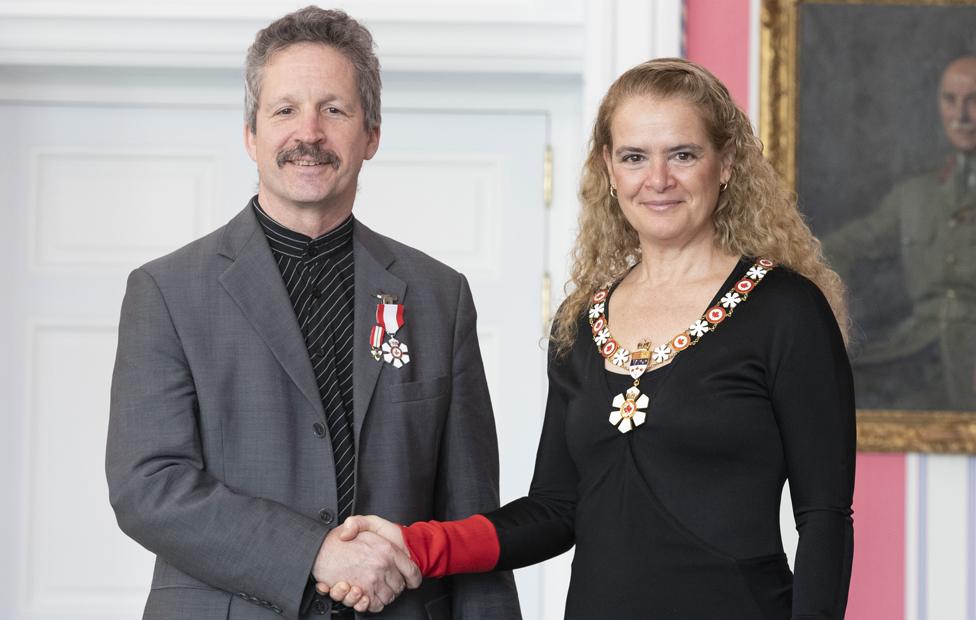 Jim Estill receiving the Order of Canada from the Governor General Julie Payette