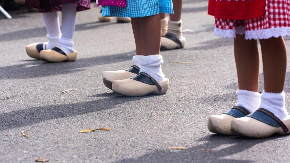 People wearing clogs in a parade in Holland