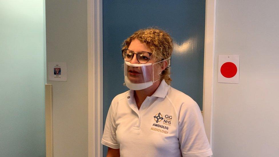 Kathryn Davies wearing the clear mask