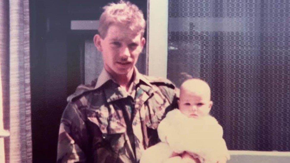 Kate Gibby as a baby with her father Mark