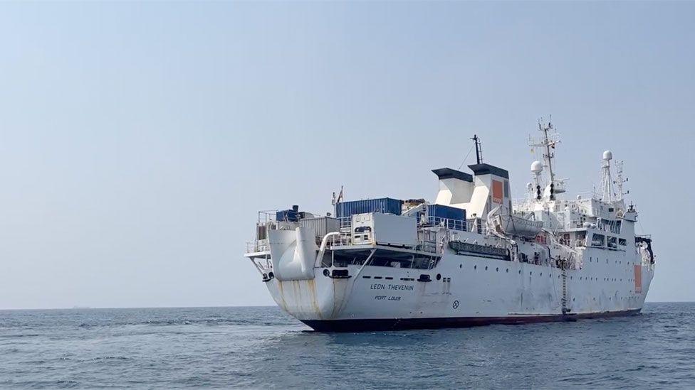 The Léon Thévenin - a large white ship - is seen at sea