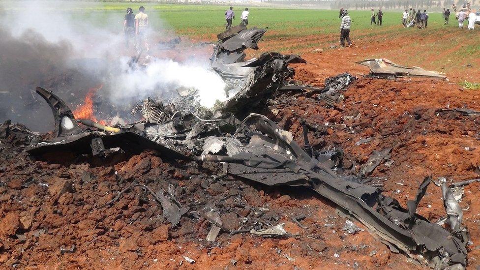 The wreckage of a government warplane in the northern Syrian town of Al-Eis on April 5 2016