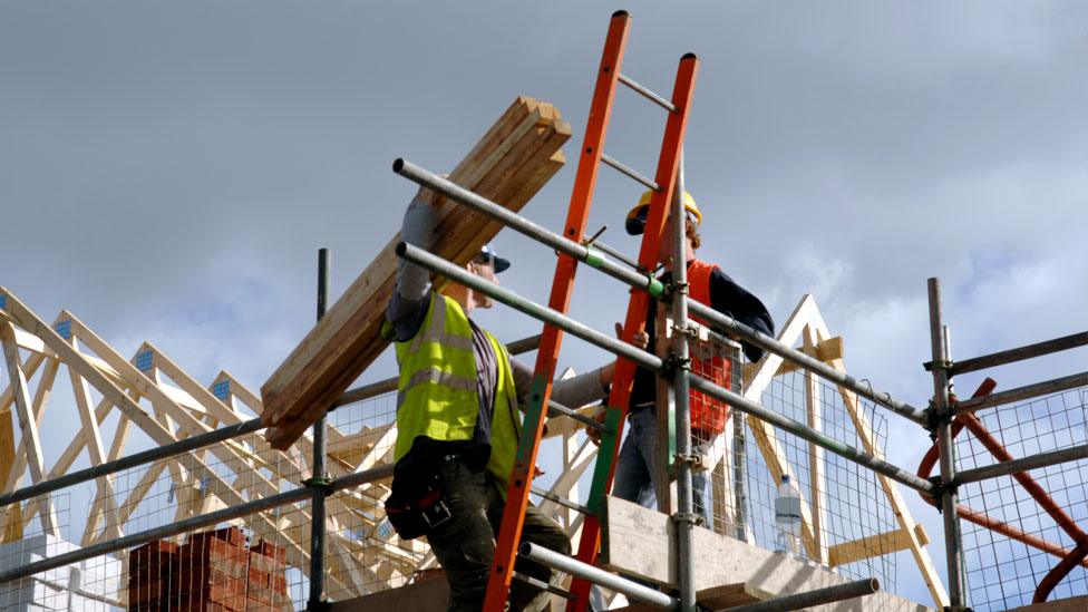 Workers on a building site