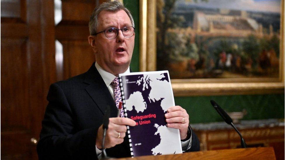 Democratic Unionist Party (DUP) leader, Sir Jeffrey Donaldson and Northern Ireland Secretary, Chris Heaton-Harris (not pictured), speak to the media on January 31, 2024 in Belfast