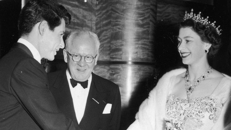 Singer Eddie Fisher meeting the Queen