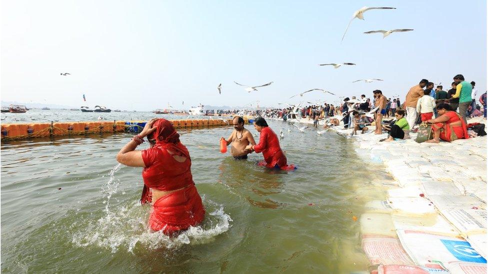 Pilgrims taking a dip at the Kumbh Mela 2019