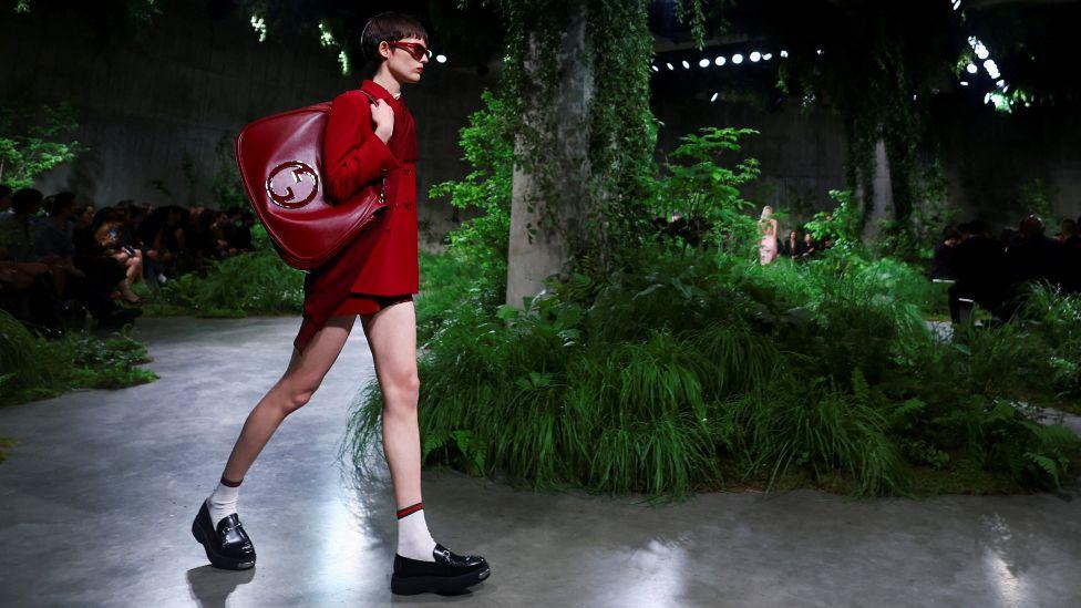 A model presents creations by Gucci at a fashion show in the Turbine Hall at Tate Modern, in London, Britain May 13, 2024. 