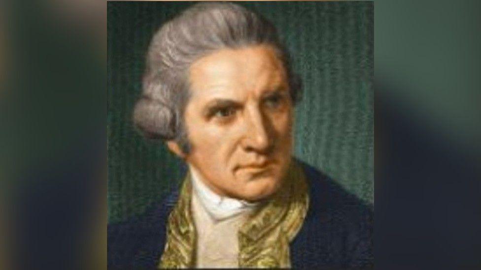 Captain James Cook's portrait. He is wearing a grey wig and a blue coat.