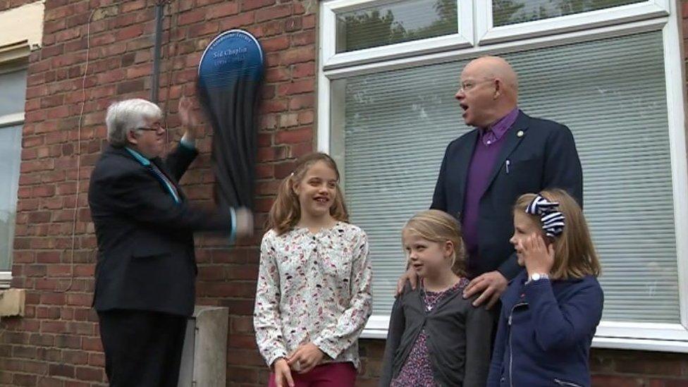 Neil Foster unveils the plaque