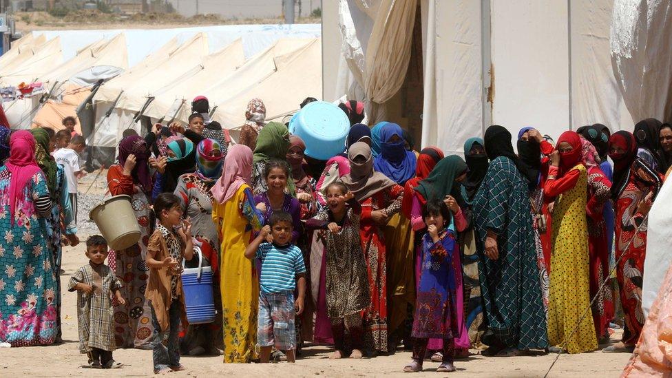 Displaced families from Mosul at a camp in Iraq