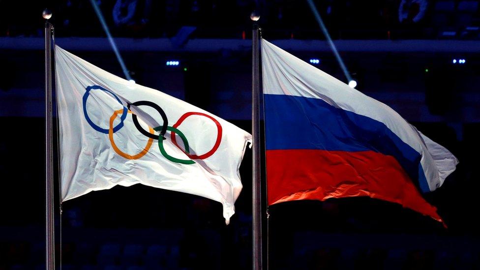 Russian and Olympic flag