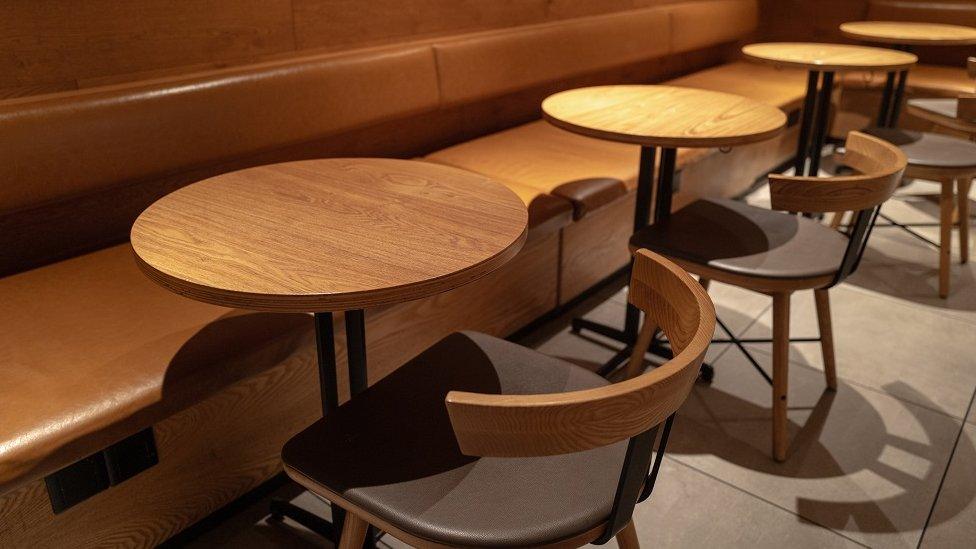 Empty restaurant chairs