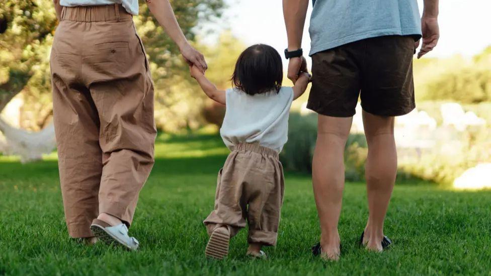 It was 'love at first sight' with their adopted baby. Then they were told he may have been trafficked