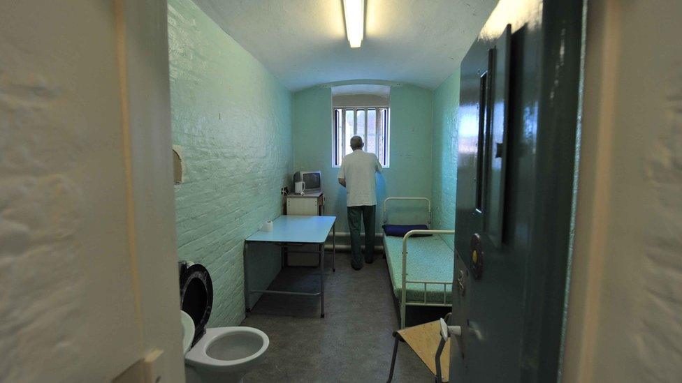 A prisoner in a cell at Wormwood Scrubs