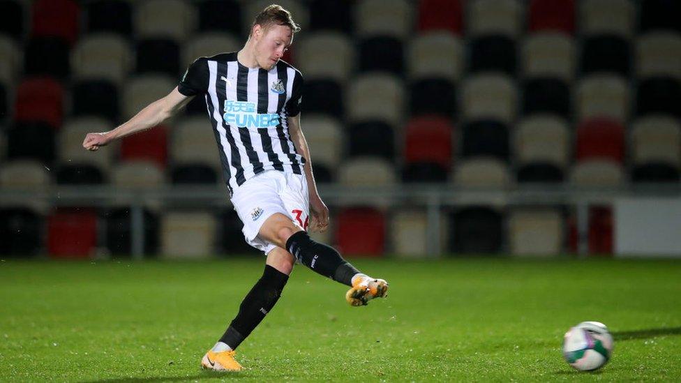 Newcastle player kicking football