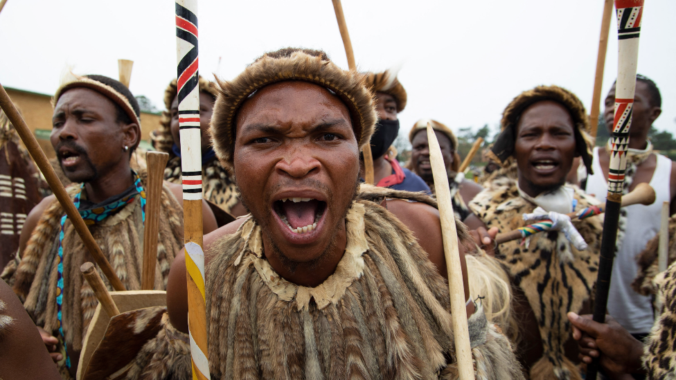 Zulu men in traditional warrior outfits in Nongoma, South Africa - 17 March 2021