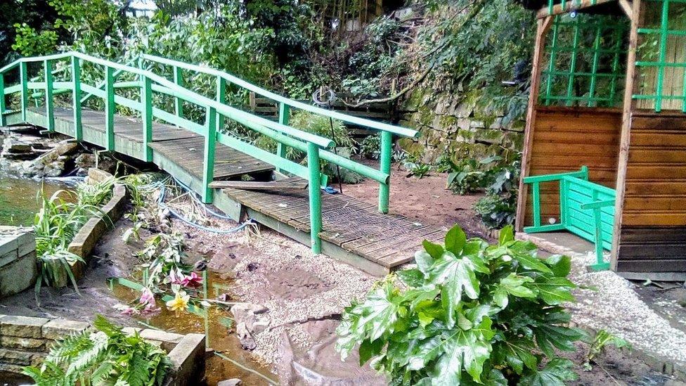 Broken bridge in a garden