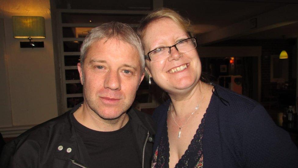 A close up picture of Christine Evans-Bradley and her late husband Paul Bradley leaning into each other and smiling