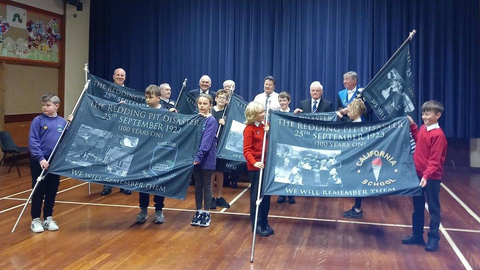 Children with banners