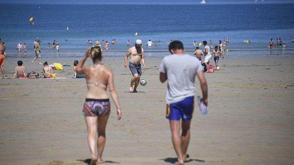 couple walking on beach