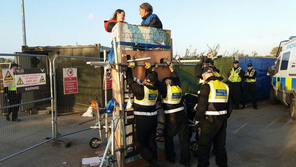 Protesters up the tower