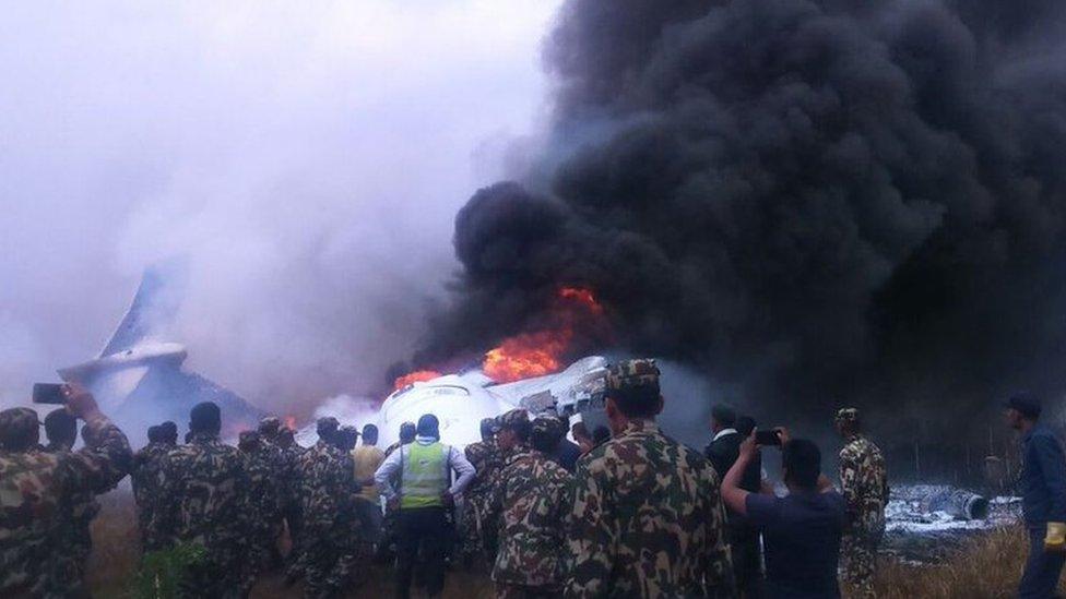 Wreckage of the plane at Kathmandu airport, Nepal, 12 March 2018