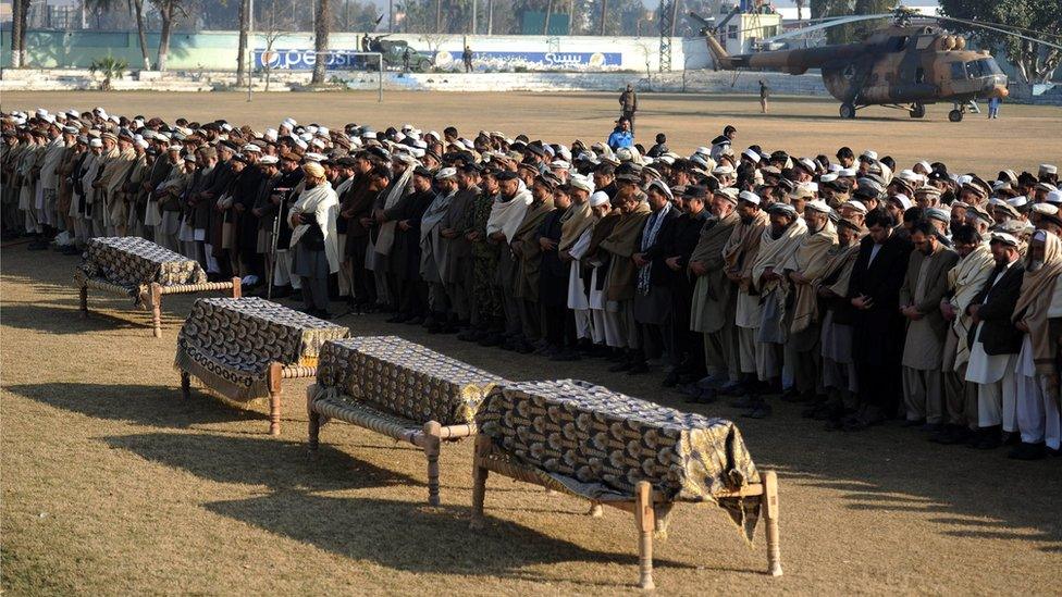 Funeral prayers for victims of a suicide bomb attack targeting pro-government provincial politician Obaidullah Shinwari in Jalalabad in January 2016