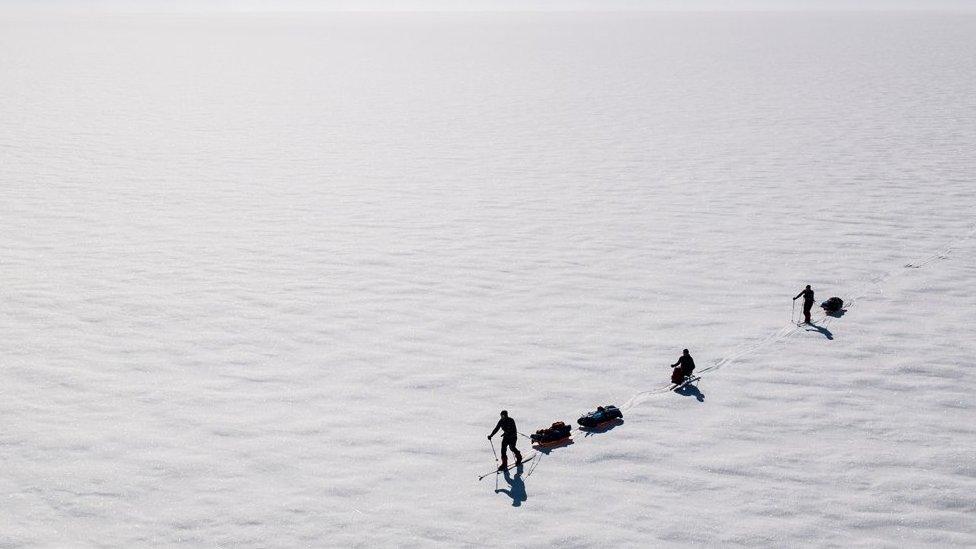 Aerial view of the team in the snow