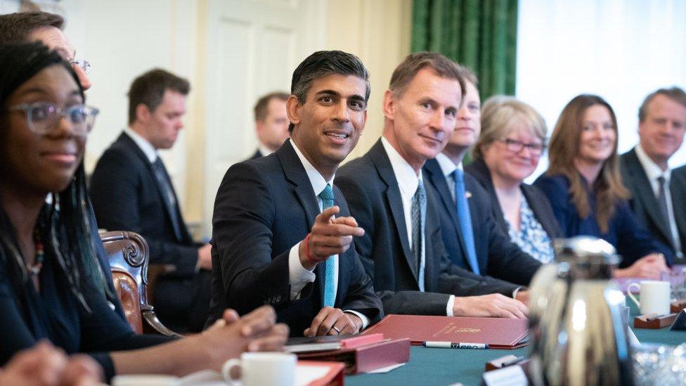 Prime Minister Rishi Sunak (C), alongside the Chancellor of the Exchequer, Jeremy Hunt, (centre right) holds his first Cabinet meeting on October 26