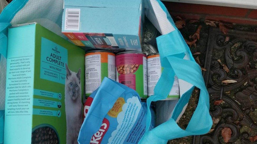 Donated pet food in a bag