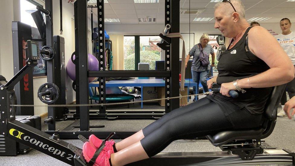 Karen Perrins on a rowing machine