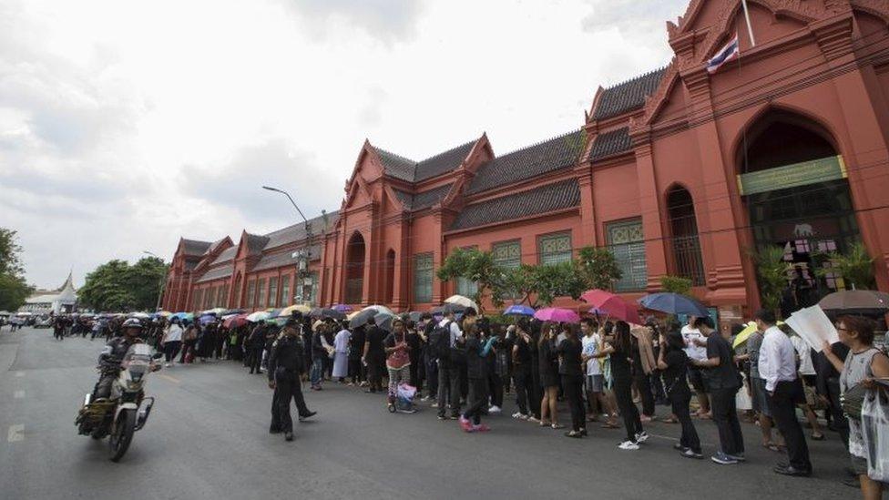 Mourners at the Grand Palace in Bangkok to pay their respects to the king who died on Thursday, 15 October 2016