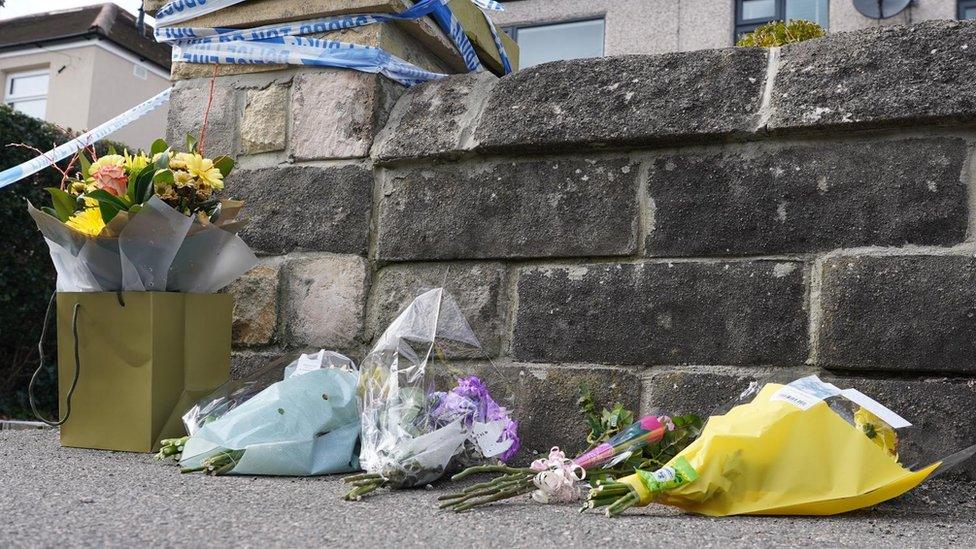 Floral tributes near scene