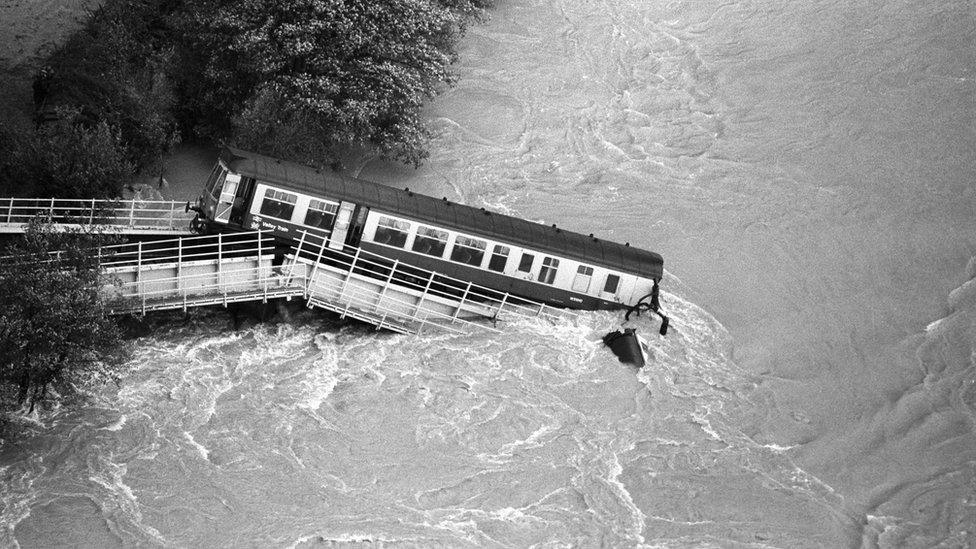 The Glanrhyd bridge disaster, a train submerged in the River Towy