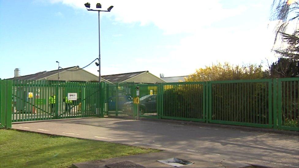 Outside gates of a manufacturing site