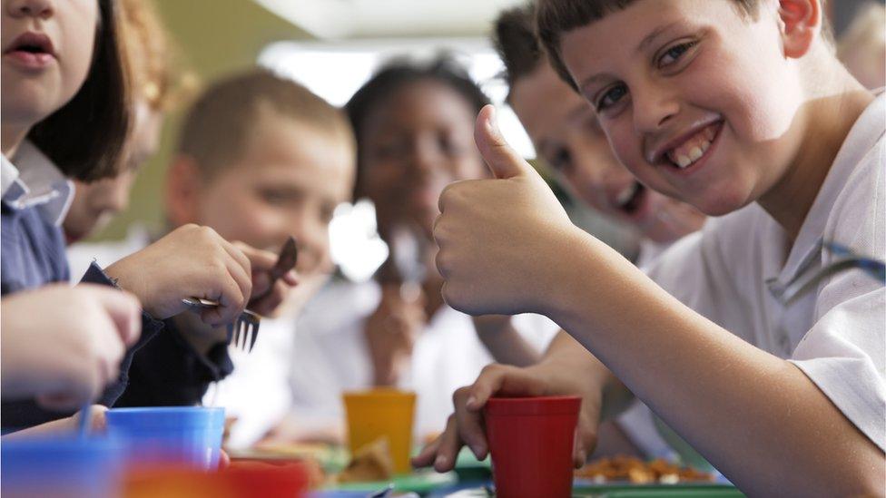 children eating school meal