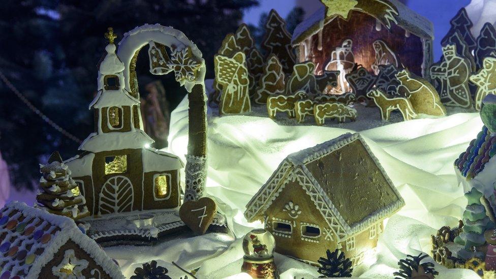 Gingerbread house, church and nativity scene.