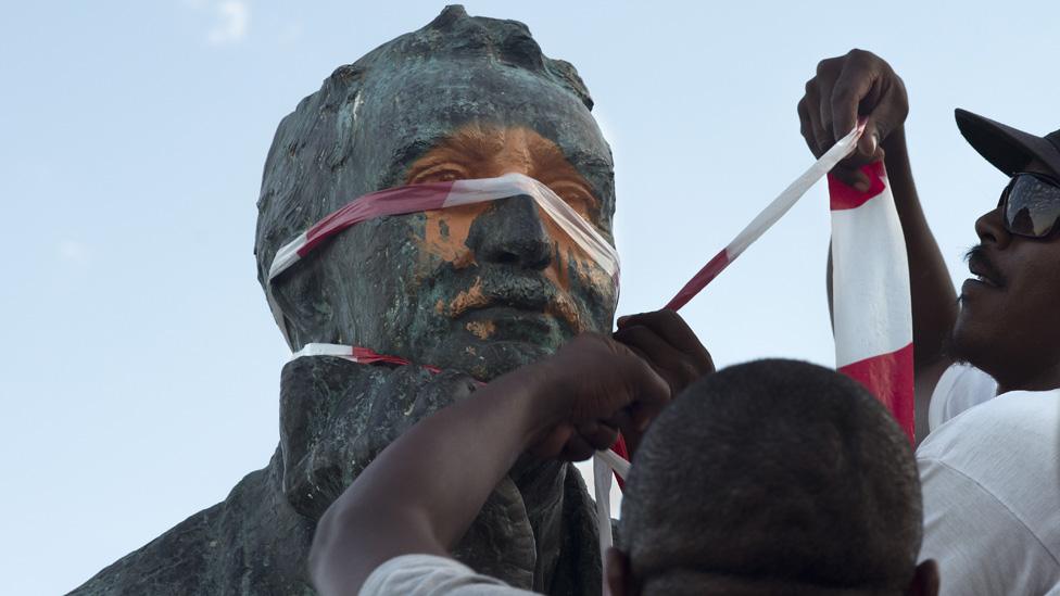 Protesters tear down Cecil Rhodes' statue in South Africa