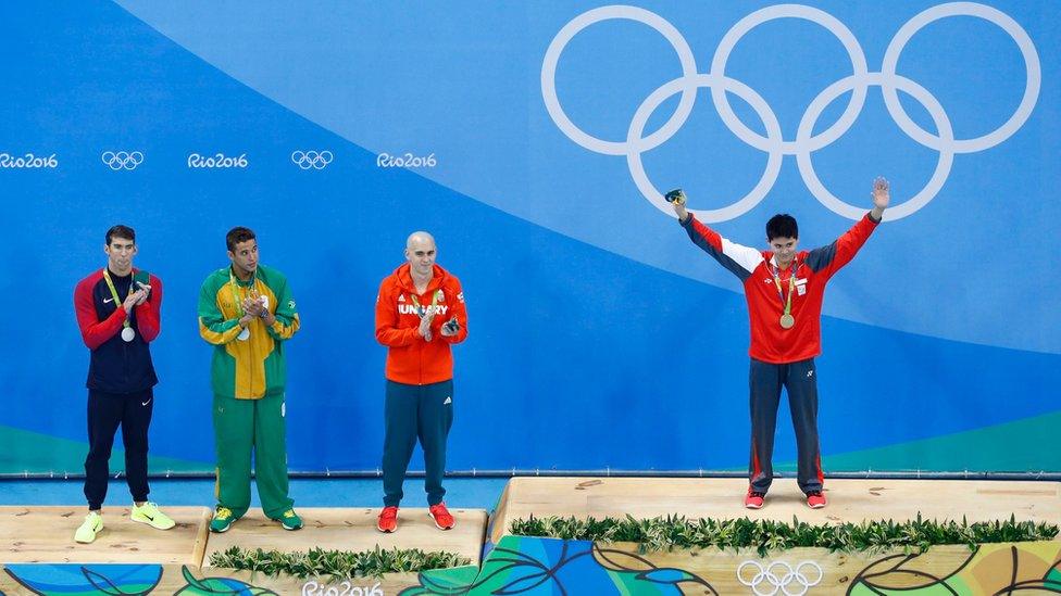 Gold medallist Joseph Schooling (SIN) of Singapore poses with joint silver medallists Michael Phelps (USA) of USA, Chad Le Clos (RSA) of South Africa and Laszlo Cseh (HUN) of Hungary