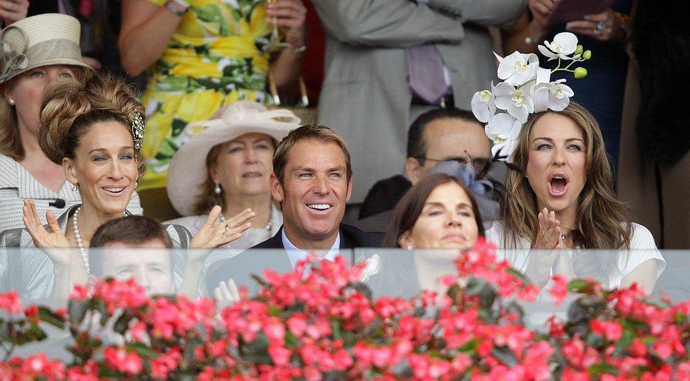 Photographed at the races with Sex and The City star Sarah Jessica-Parker (L) and former flame Elizabeth Hurley (R)