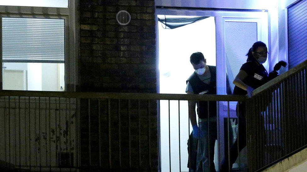 French police investigate an apartment during a police raid in Boussy-Saint-Antoine near Paris, France, on Thursday