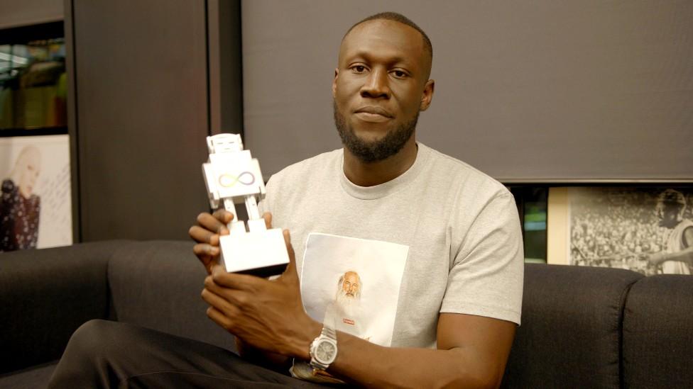 Stormzy accepts his AIM Award