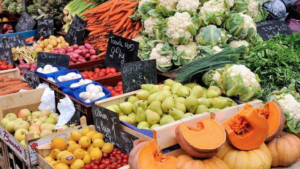 A view of fruit and vegetable stalls at a market in Lille, on August 18, 2013.