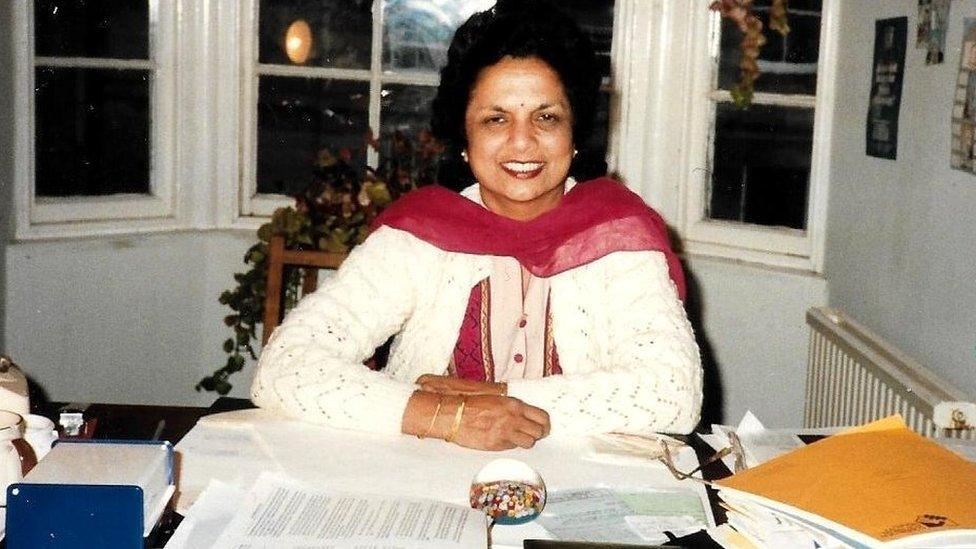 Saroj Lal at her desk at the Lothian Racial Equality Centre where she was director until 1996