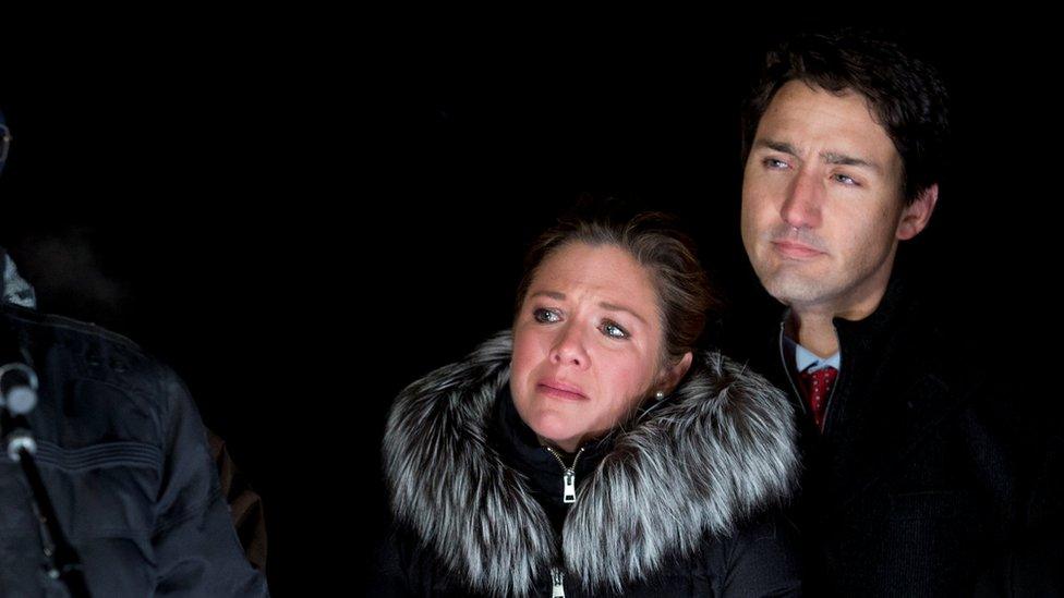 Canadian Prime Minister Justin Trudeau and his wife Sophie, holding back tears, attend a vigil held in honour of the victims January 30, 2017.