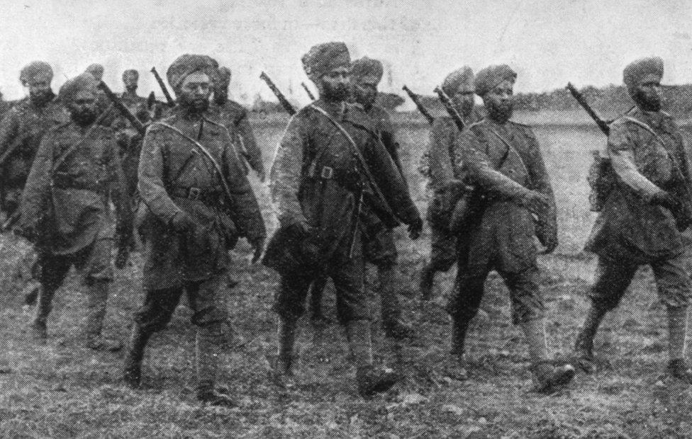 Welcome Invaders of France'. Sikh soldiers on the march in France at the start of World War I. Original Publication: The Graphic - pub. 1914