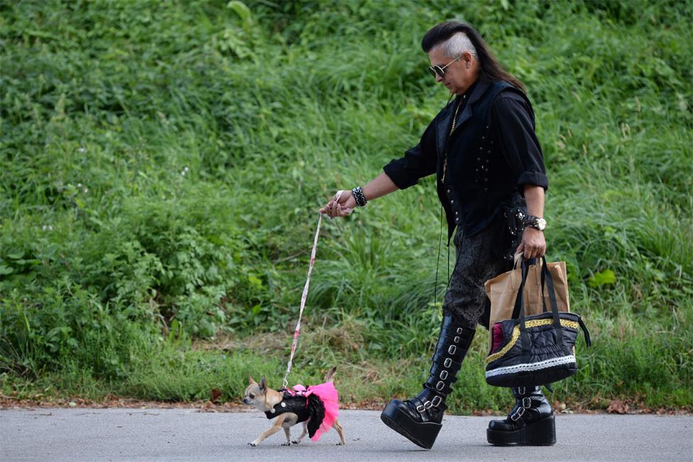 Steampunk enthusiast Dante Prince with his dog, Peyton